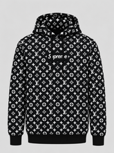 Black monogram-pattern pullover hoodie with a Supreme-style box logo and attached hood.