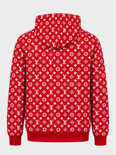 Back view of the red monogram-pattern hoodie featuring an all-over repeating design.
