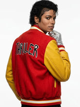 Red Thriller varsity jacket with THRILLER lettering on the back and yellow leather sleeves
