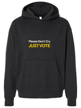 Black pullover hoodie with white and yellow Please Don't Cry Just Vote text on the chest and a front kangaroo pocket