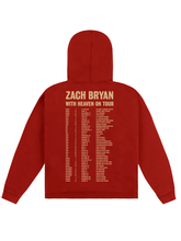 Red pullover hoodie with tan Zach Bryan With Heaven On Tour text and full tour dates list printed on the back