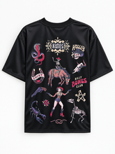 Back view of black graphic t-shirt featuring western tattoo flash art including skeleton cowgirl, snake, and horseshoe designs