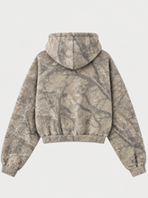 Back view of tan and grey treecamo zip-up hoodie showing hood and fabric texture