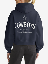 Back view of navy Dallas Cowboys hoodie featuring star logo and wordmark graphic