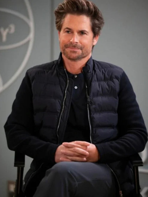 Rob Lowe as Ellis Dragon in Unstable wearing navy quilted bomber jacket with ribbed sleeves