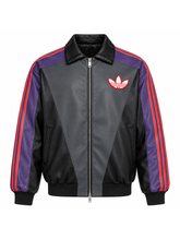 Front view of the Gengar colorway leather track jacket showing the grey chest panel and trefoil logo.