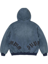 Blue washed cotton hooded jacket with plaid lining, leather appliqué details, front pockets, ribbed cuffs and hem.