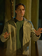 Drew Starkey as Rafe Cameron in grey fleece zip-up jacket, Outer Banks night scene