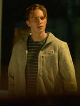 Rafe Cameron wearing grey North Face style fleece jacket in Outer Banks