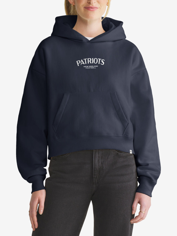 Woman wearing navy New England Patriots foundation hoodie, front view with chest wordmark