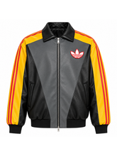 Front view of the Pikachu colorway jacket showing the yellow 3-stripe sleeve trim.
