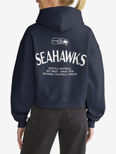Back view of navy Seattle Seahawks hoodie featuring hawk logo and wordmark graphic