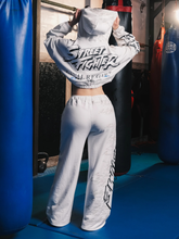Back view of white cropped hoodie with Street Fighter logo and Civil Regime text