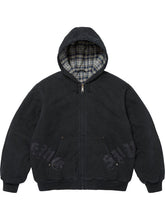 Black washed cotton hooded jacket with plaid-lined hood, dark leather appliqué lettering, front pocket and ribbed cuffs.
