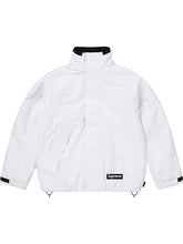 White Supreme Gore-Tex jacket with hood down, front view highlighting the clean colorblock silhouette.