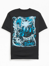 Back view of black t-shirt featuring full blue and white creature illustration and The Thing movie title